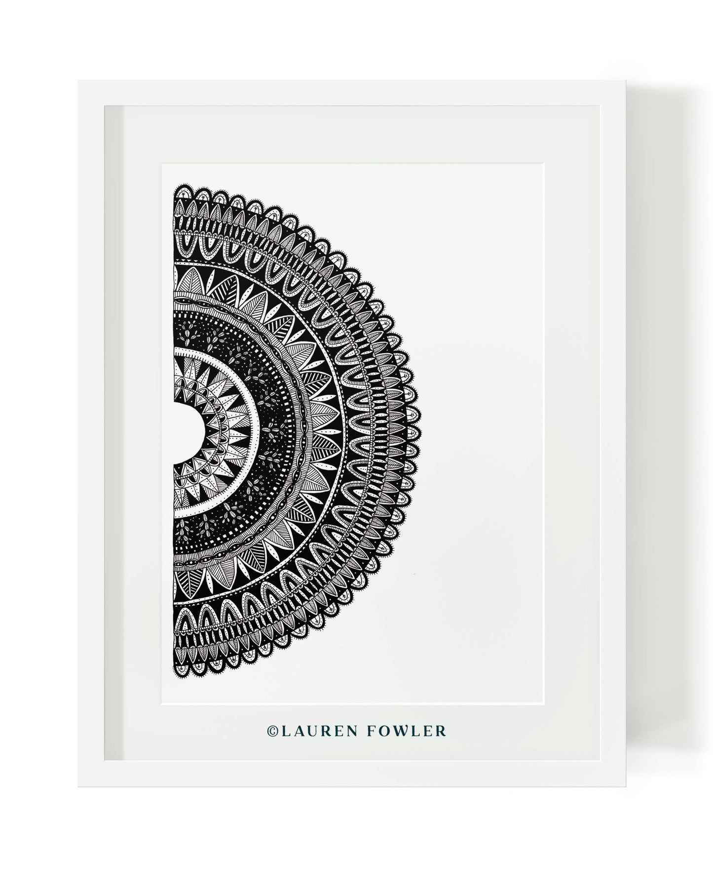Black and white half mandala illustrated artwork by Lauren Fowler